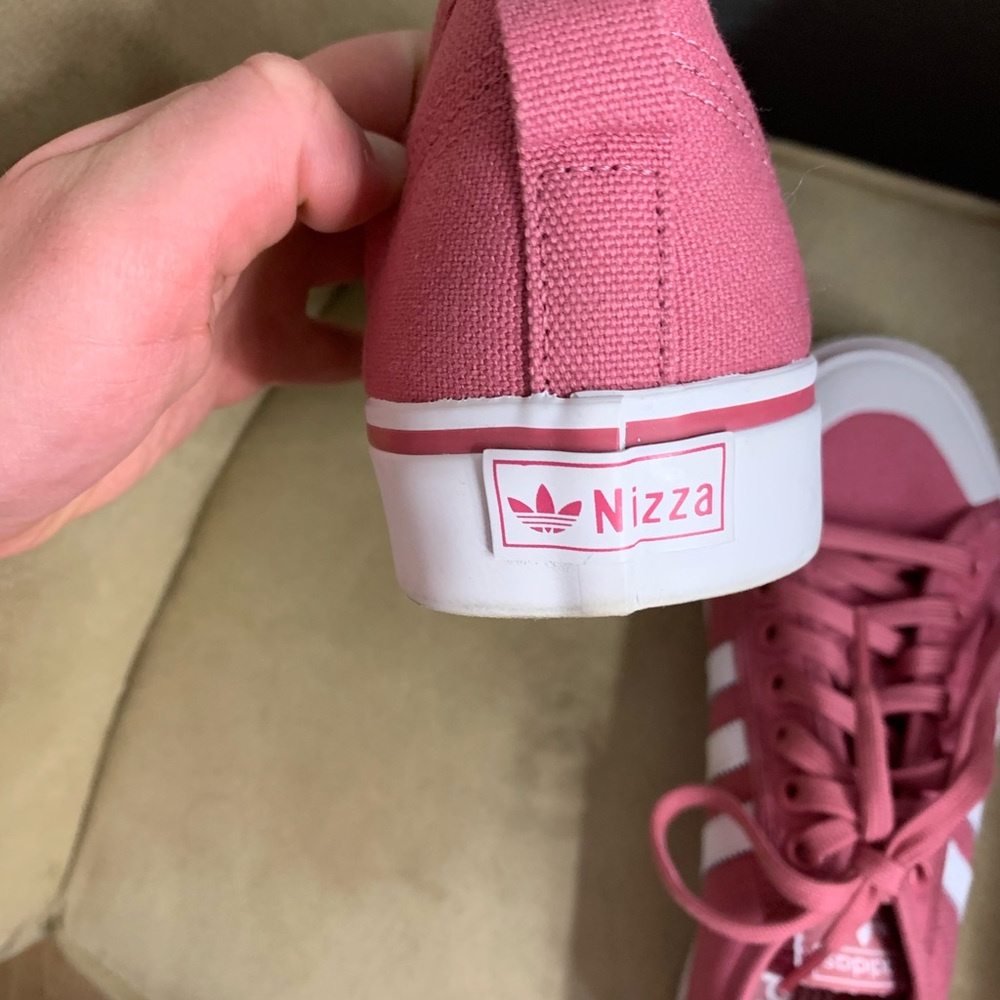 Pink and white Adidas shoes